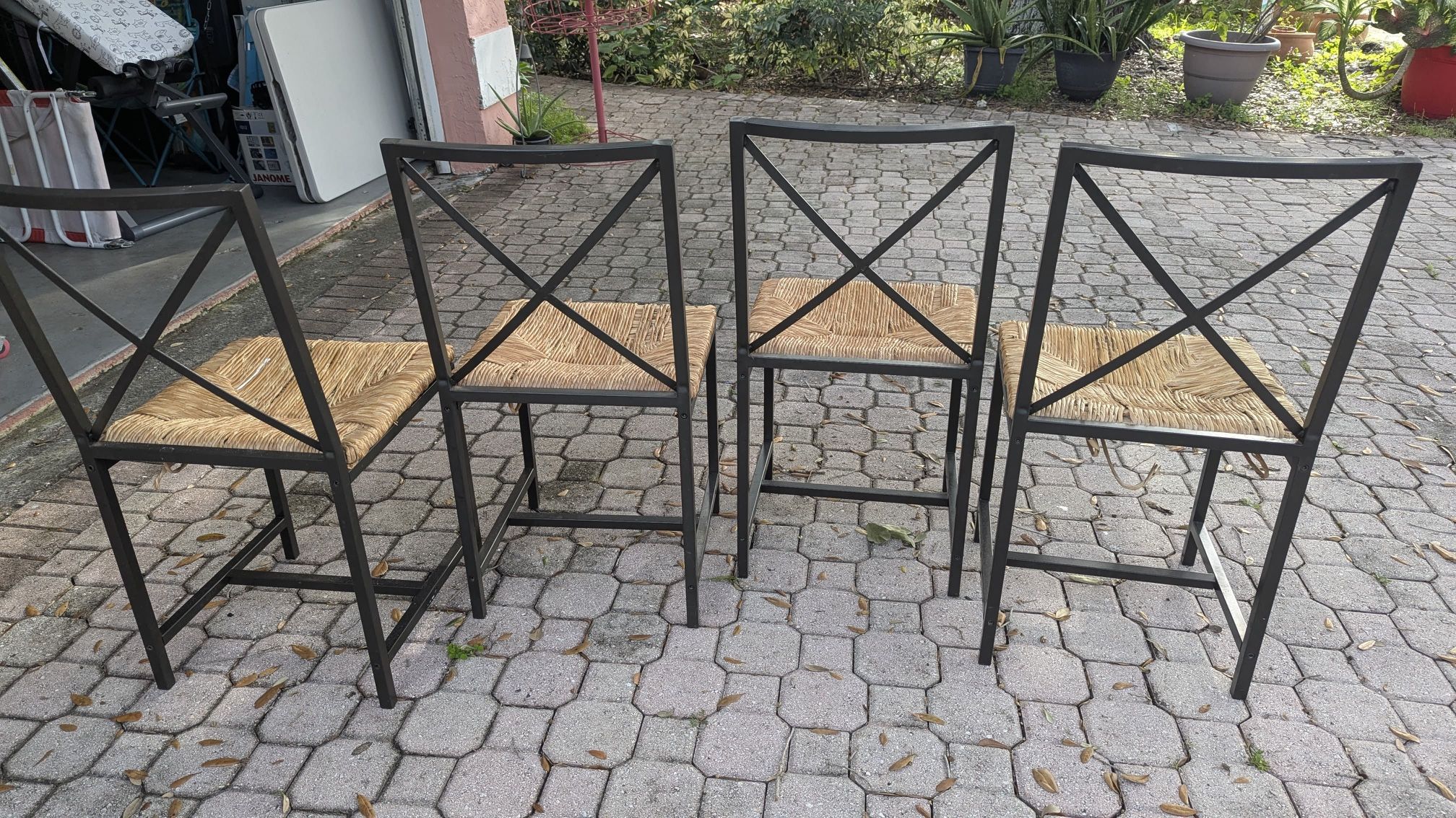 4 Metal And Straw Chairs! **