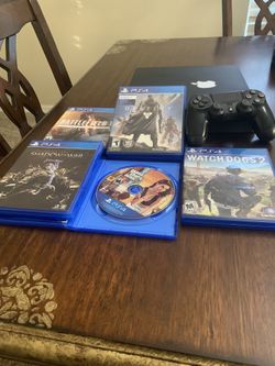 Ps4 slim 1tb with 2 controller and 5 games
