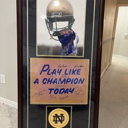 Play Like A Champion Today. Signed 