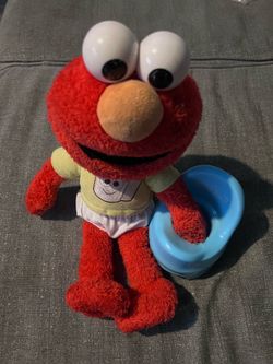 Taking Elmo with potty