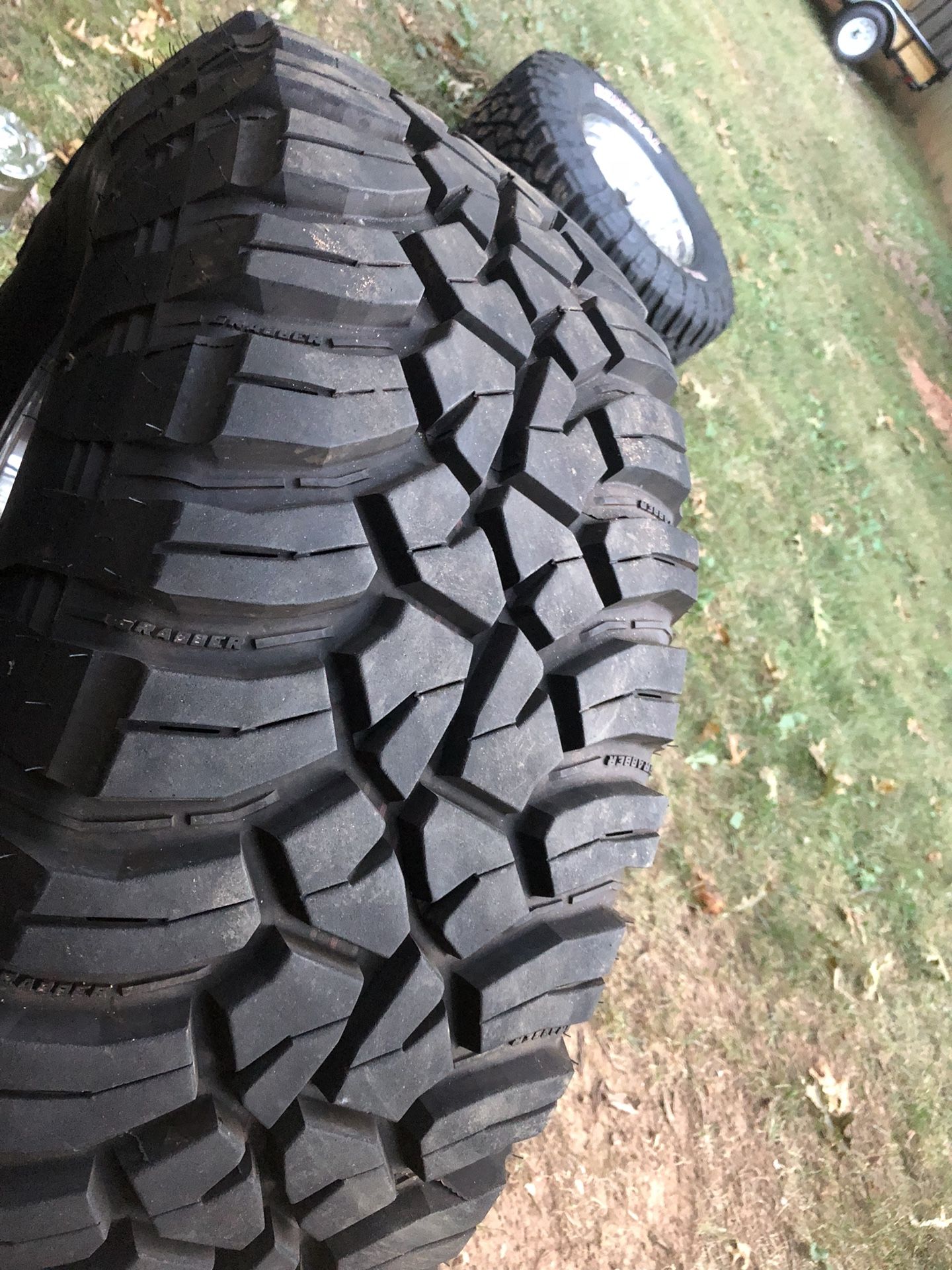 35x12 50r17 general grabber x3 and 17x9 pro comp bullet holes for sale