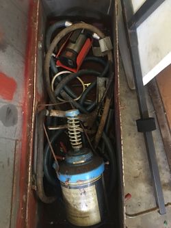 Grease gun and electric fuel pump with nozzle