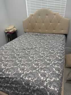 Queen-size bed with mattress, lightly used – US$300