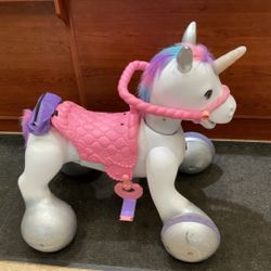 Kid Trax 12V Rideamal Unicorn Interactive Ride-On Toy with Lights & Sounds