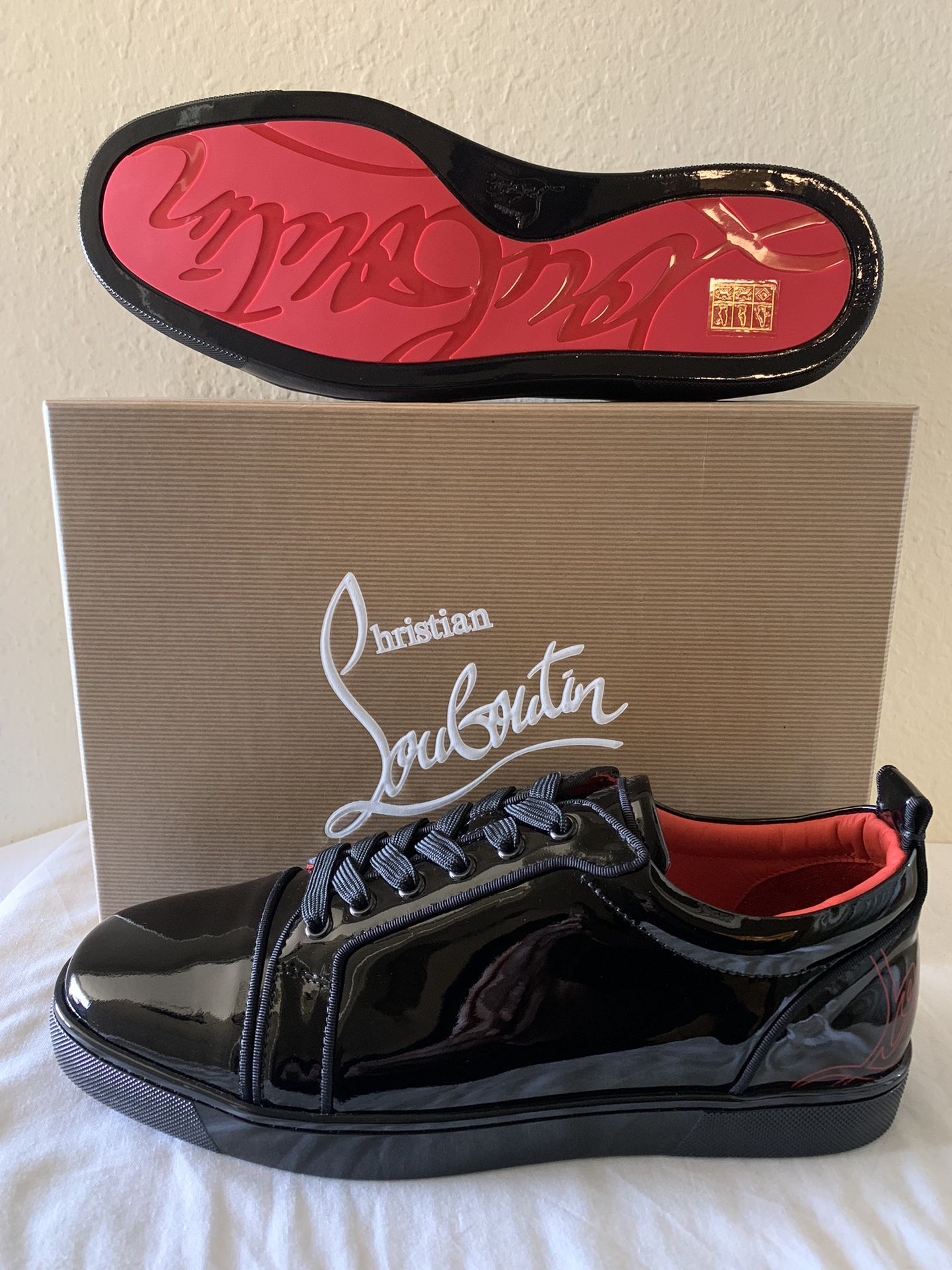 CHRISTIAN LOUBOUTIN RED BOTTOM SNEAKERS