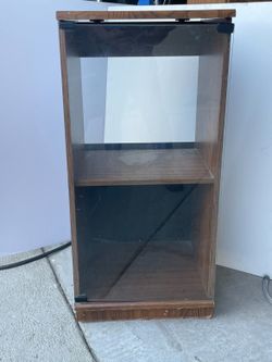 Wooden Cabinets For stereo Or Any Other Electronic Device In A Very Good Condition With Glass Door And Wheels 16x18×38