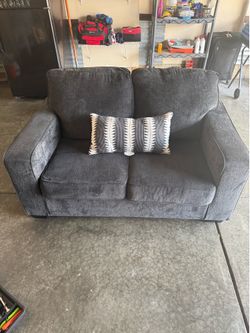 Grey loveseat couch