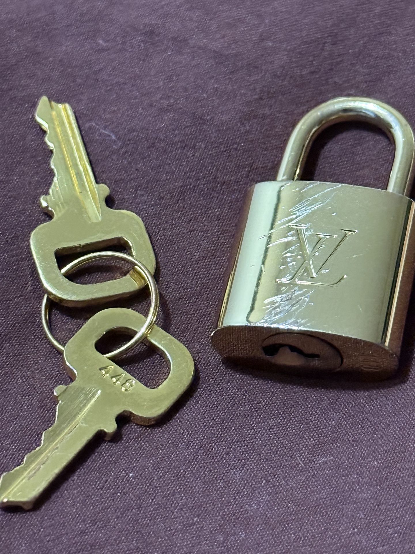 Authentic Louis Vuitton Lock W Key