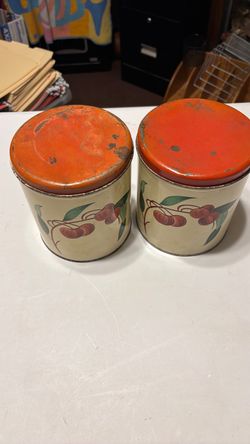 Vintage metal apple tins