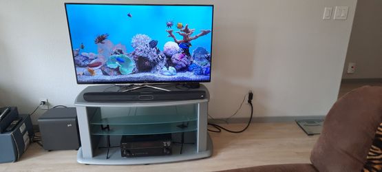 TV and sound bar with woofer.  Also, pioneer  receiver