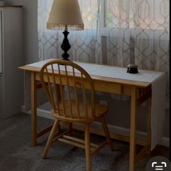 Desk and chair, sofa, table, and table, coffee table, large gold mirror, curio cabinet with glass shelves