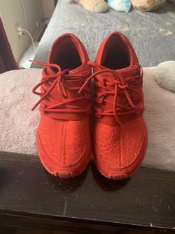 Red adidas shoes
