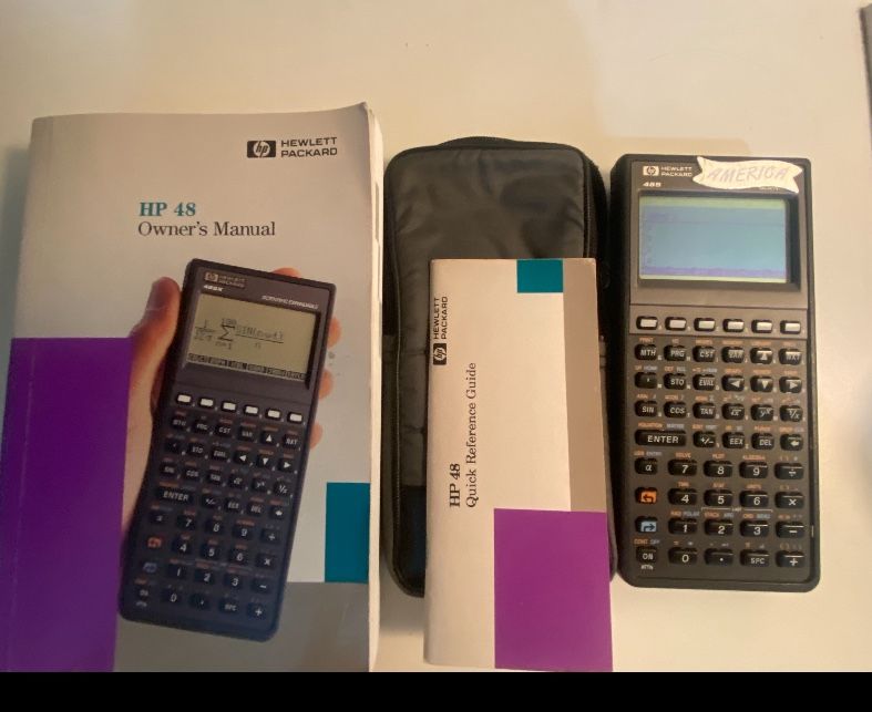 Hewlett packard 48S graphing calculator and manual