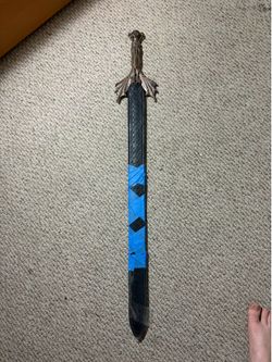 Pretend Sword with Custom Brass Griffin  Topping and leather sheath/metal shaft