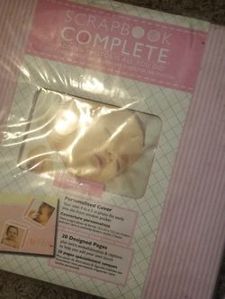 Never used baby scrapbook album and walhanging