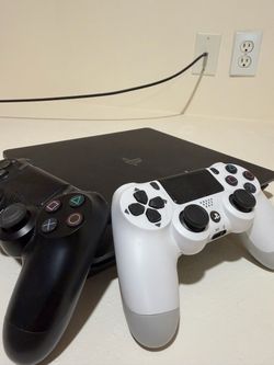 Sony PS4 Slim 1TB + 2 DualShock 4 Controllers + HDMI & Cables