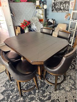 Dark Brown Dining Set with Swivel Leather Seats