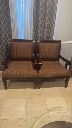 2- Upholstered Wooden Chairs. Elegant and classic. $ 300 for both,