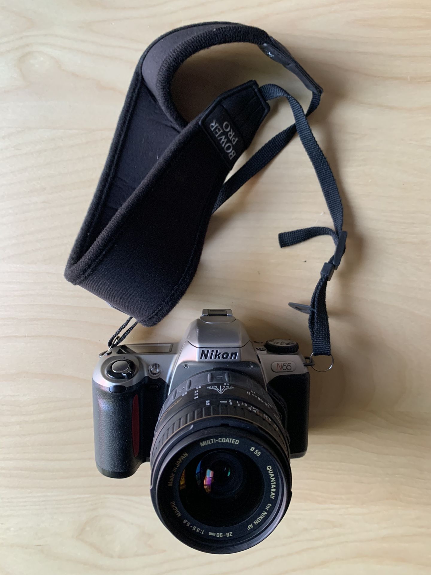Nikon N65, 35mm film camera, with strap