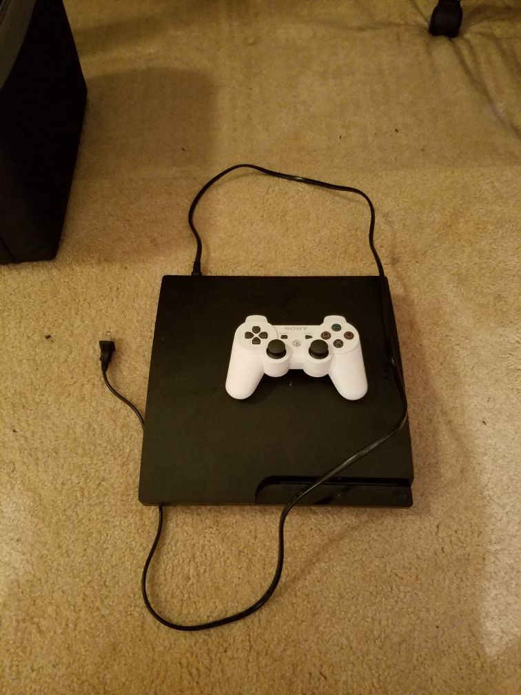 PS3 with controller and power cord