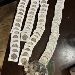 20 Oz Pure Silver Rounds And 52.4 Dollar Face Of 90 Percent Silver 