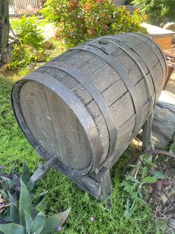 old wine barrel and citrus tree heater
