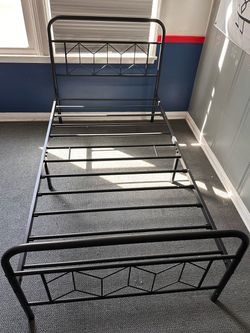 Black metal twin bed frame