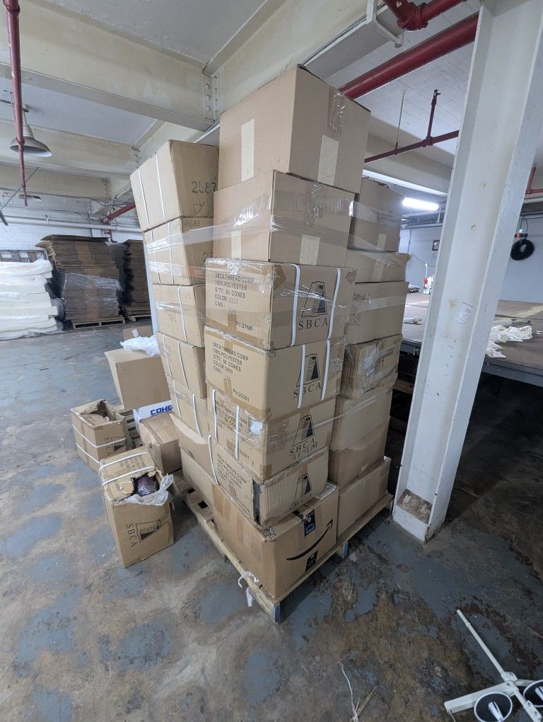 Over 1,000 Cones Of Polyester Thread, Fabrics And Cutting Machines For Sale