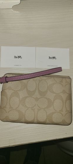 New never used Rose Beige Coach Wristlet $25