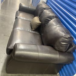 Comfy Leather Couch (free delivery)