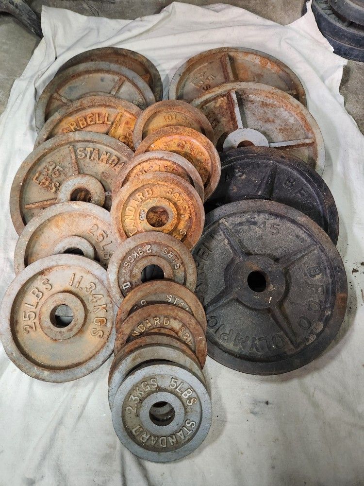 (440 LBS . OF OLYMPIC WEIGHTS )