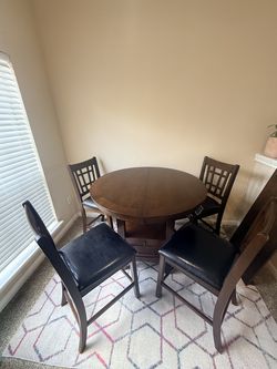 Round shape + 4 matching chairs + storage base and extendable table set
