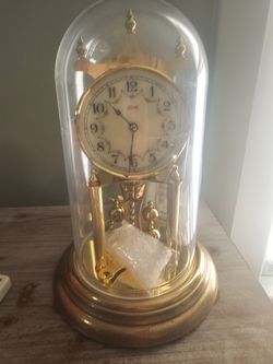Kundo Anniversary Clock (400-Day / Torsion Clock) with glass dome.