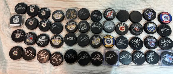 NHL Lot of 50 Autographed Pucks