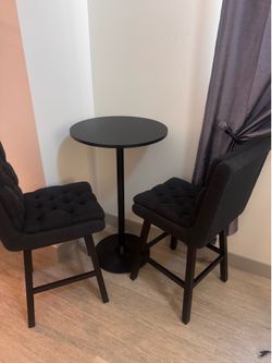Black table and chairs