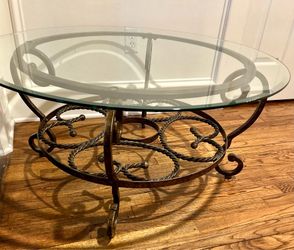 ROUND GLASS COFFEE TABLE