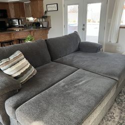 Like NEW Sectional Couch & Storage Ottoman