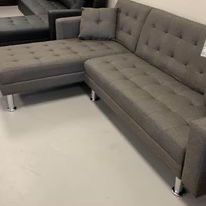 Brand New sectional,  reversible sleeper   Gray or black available 