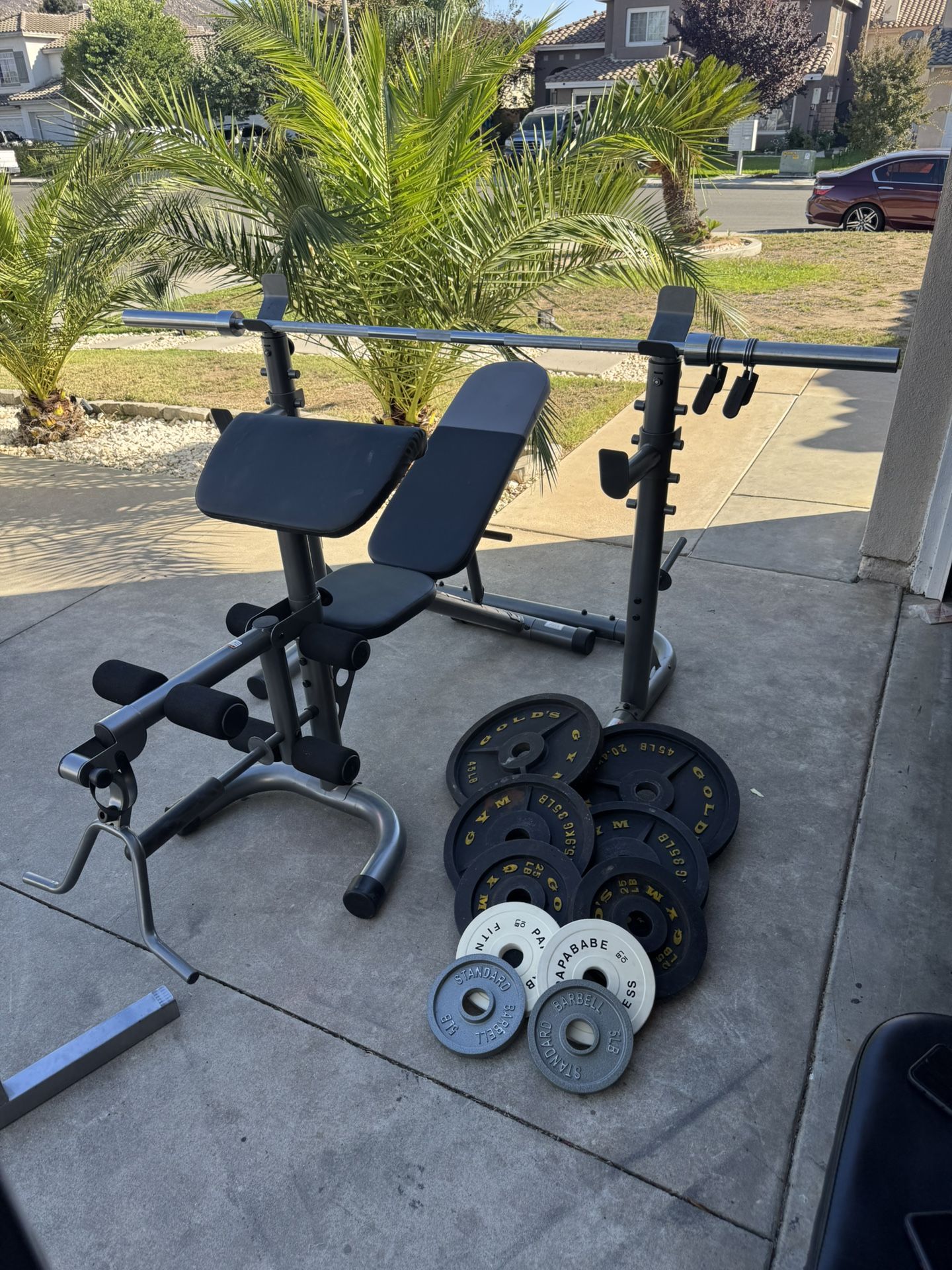 Bench press/squat rack with 7ft 45lbs bar plus 240lbs of Olympic weights