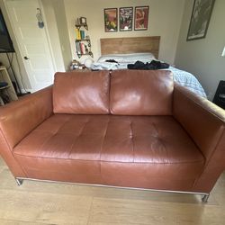 Brown leather sofa (love seat)