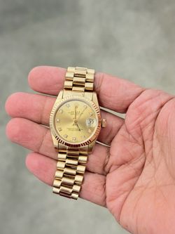 Rolex Ladies 31mm Presidential 18KT Gold Champagne Diamond Dial