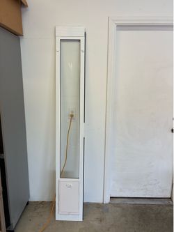 Dog door for sliding door
