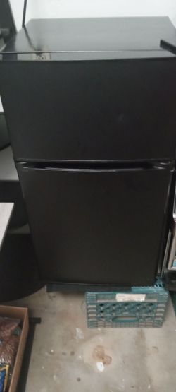 Mini refrigerator with two doors separate top freezer