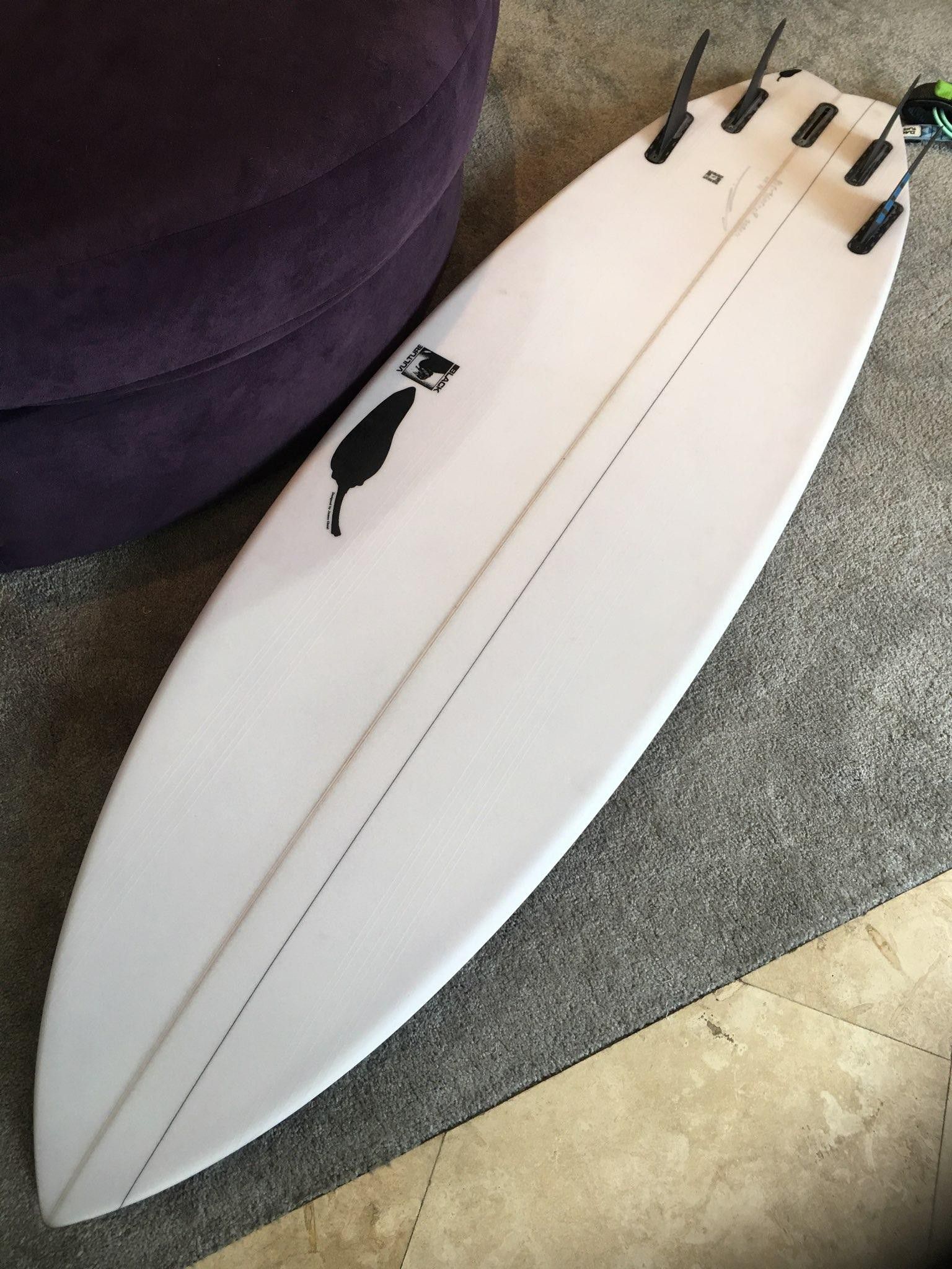 Surfboard with leash and bag
