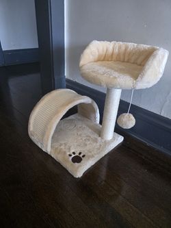 Cat chair, scratcher with toy ball.