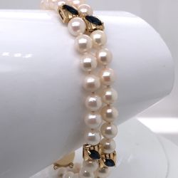 14 K solid gold with culture pearls and sapphire Bracelet   