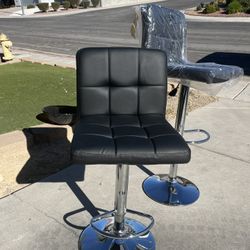 Brand New Set of 2 modern black leather swivel bar stools, height adjustable