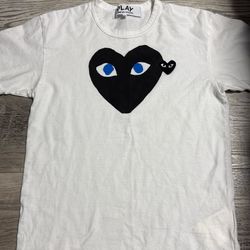 Size: Medium.    Comme Des Garçon shirt