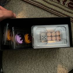 Prismatic evolution Dice and Coins 