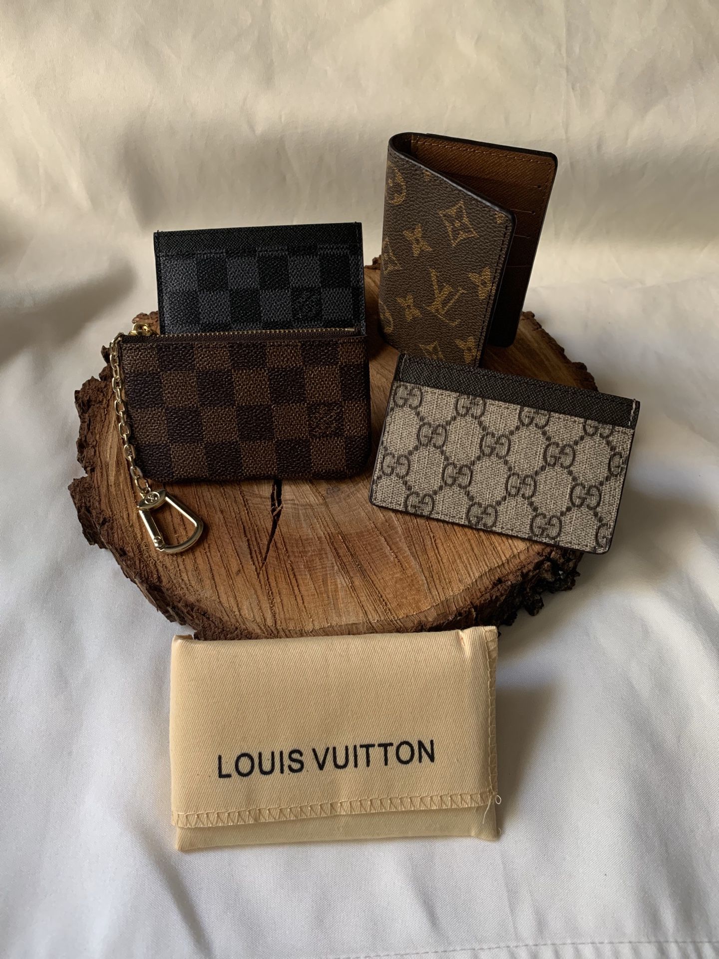 LV wallets and one Gucci Wallet !